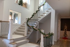 Staircase-with-Christmas-Decor-at-The-Woodford