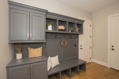 Custom Storage and bench in the mudroom at The Woodford