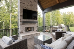 The Woodford Covered Porch with Fireplace and Grill Station