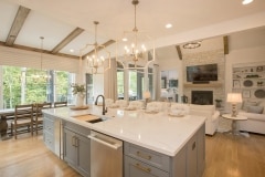 Oversized Island With Seating and Appliances at The Woodford