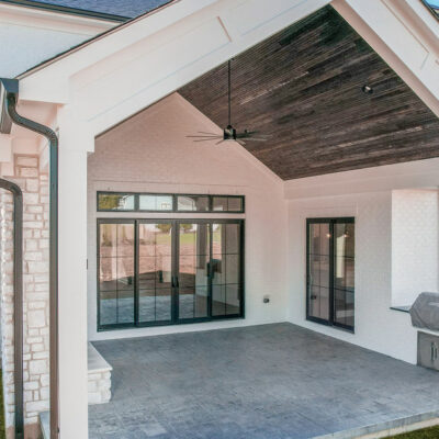 Covered Rear Patio with Fireplace and Grilling Area