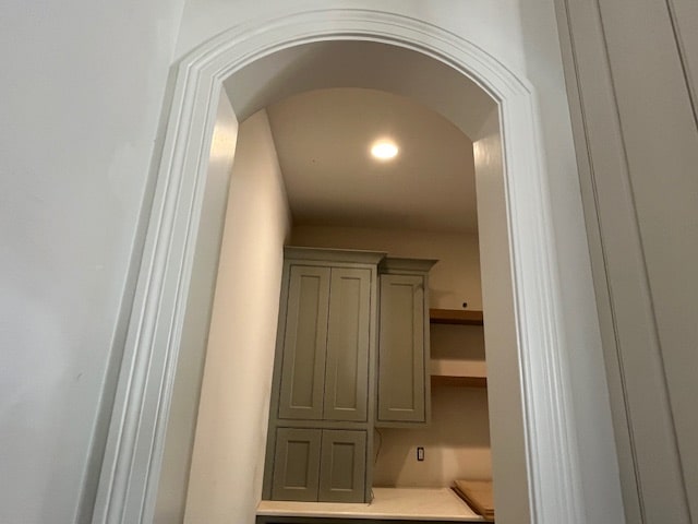 Arched Doorway to Walk-In Pantry