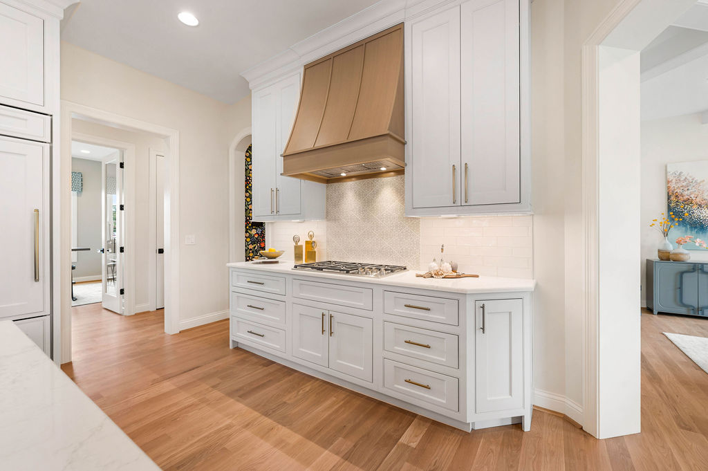 Pickwick Place Kitchen with White Oak Island and White Cabinetry