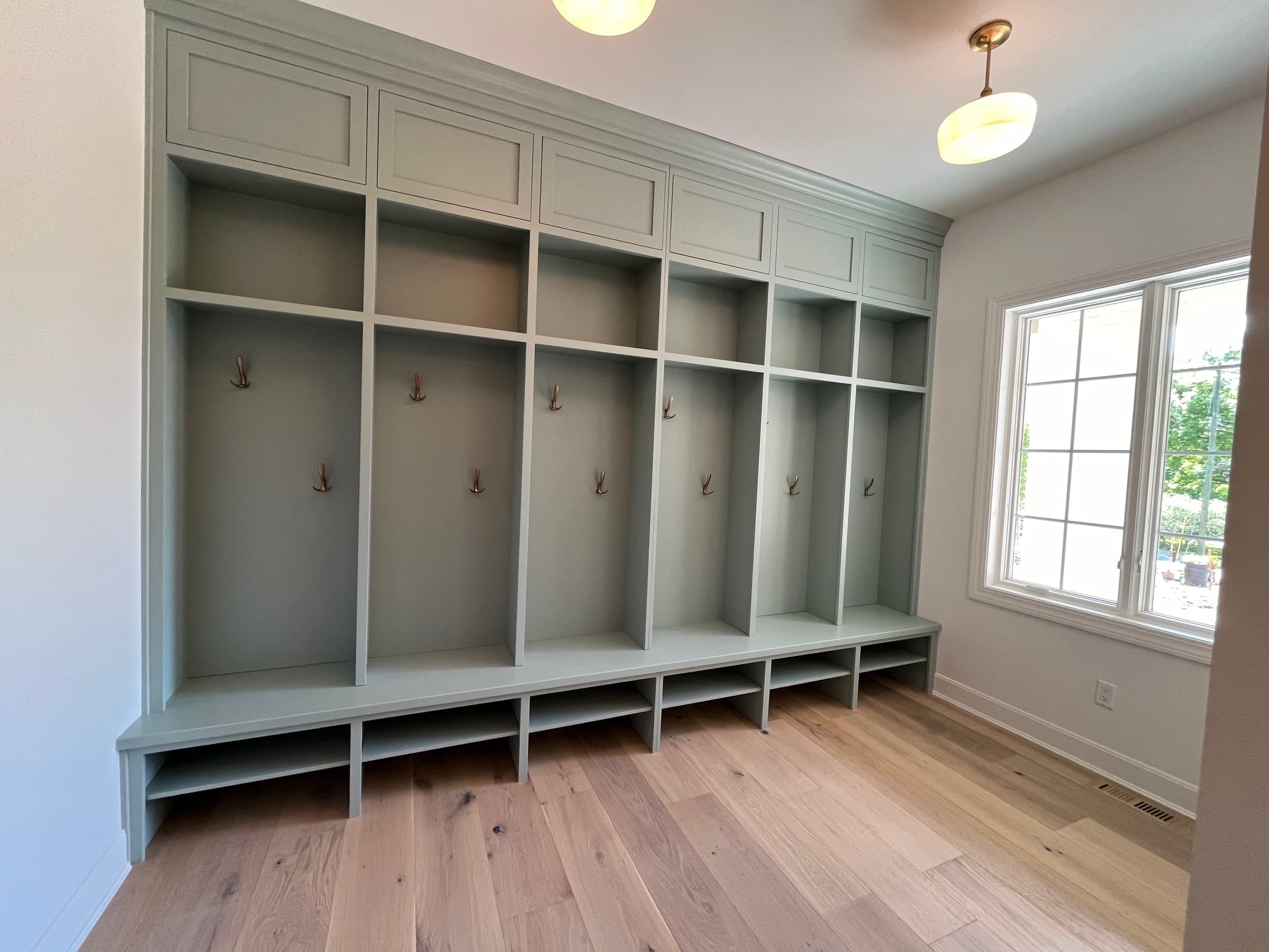 Mudroom with Cubbies and Window at The Arden